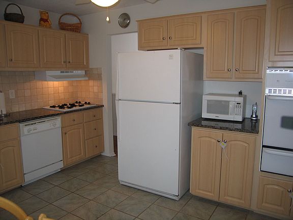 updated kitchen with granite and newer appliances