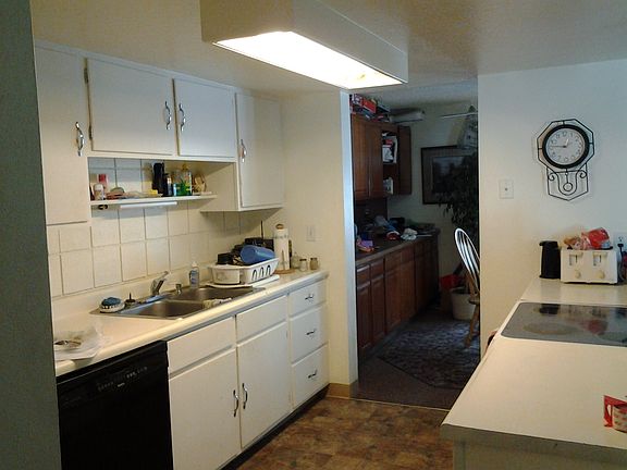 From kitchen toward dining room with built in storage