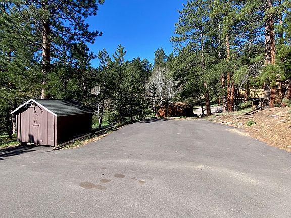 Renters Private Parking to the left closest to the shed.