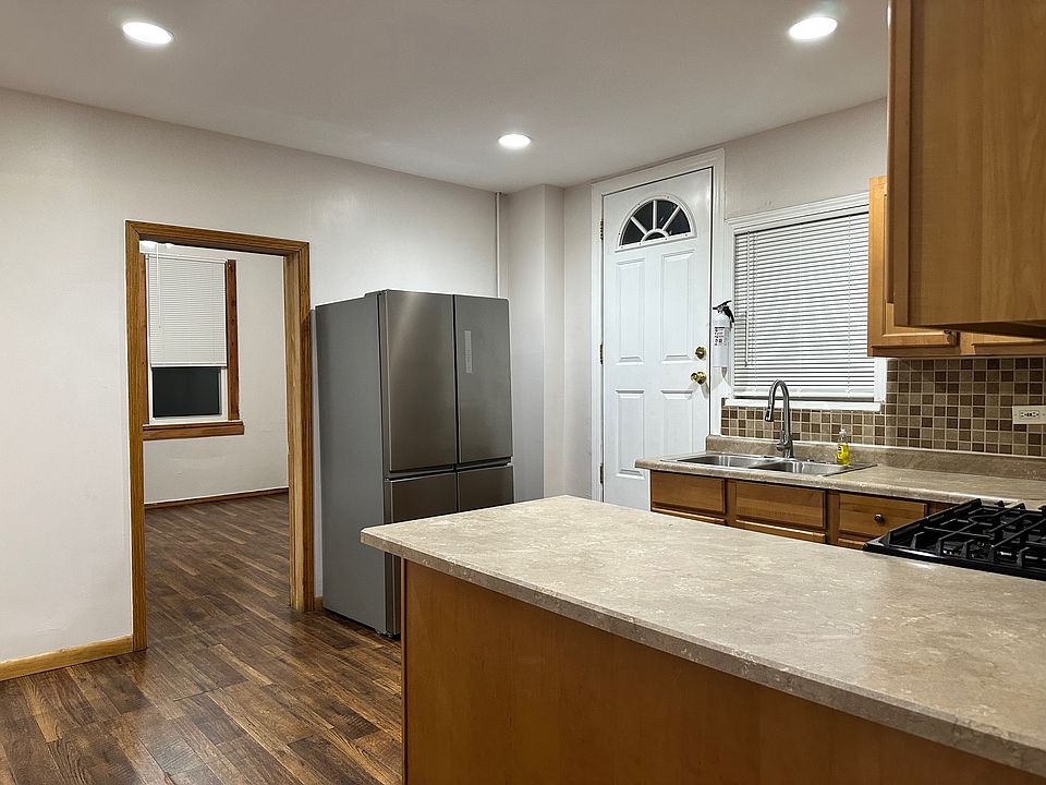 Kitchen with bedroom 1 and emergency exit door