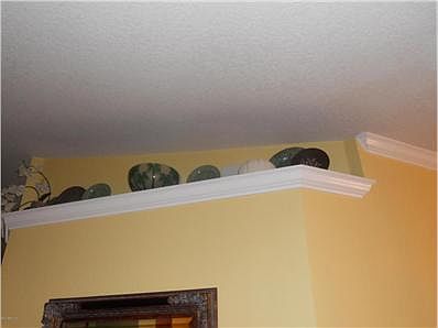 custom crown molding on plant shelf