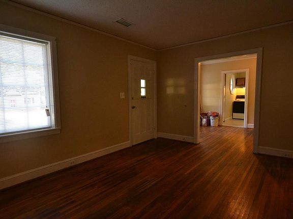 Living room towards dining room and kitchen