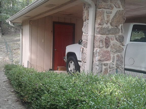 Carport with storage room