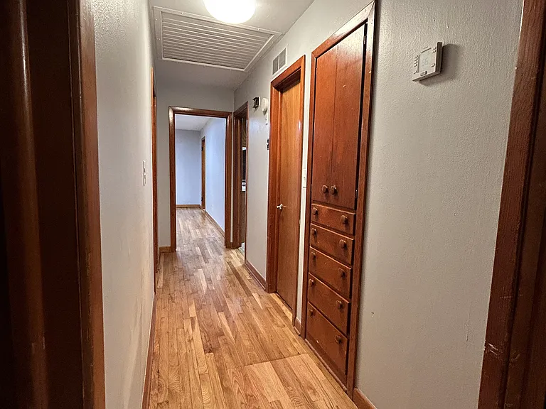 Hallway looking back toward living room. Lots of storage.