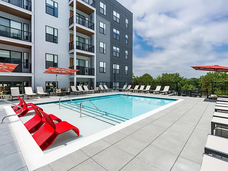 Cool off or lounge in style at the refreshing pool deck at Modera LoSo.