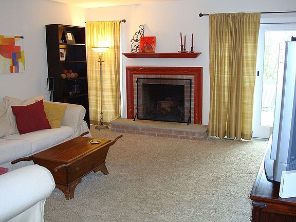 Cathedral ceiling, sliders to large deck from Living Room
