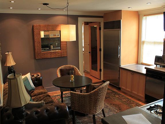 Nice kitchen with concrete counters and Sub-zero fridge.