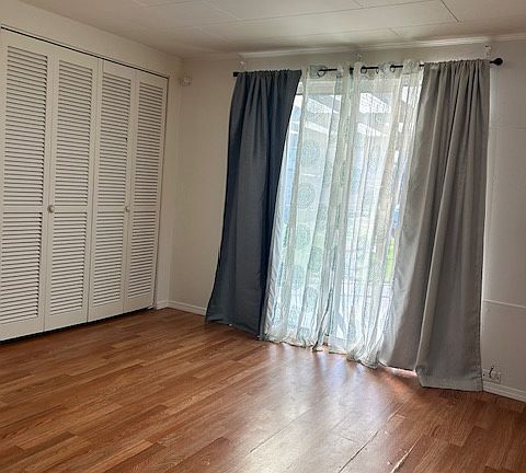 Primary bedroom with 1/2 bath