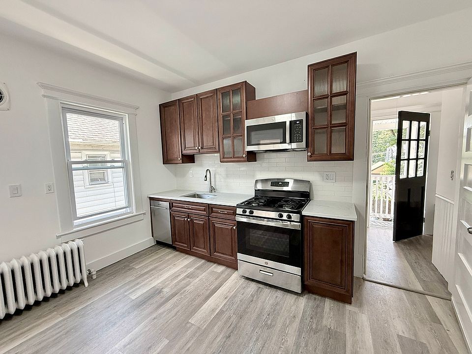 Brand new eat-in kitchen with dishwasher.