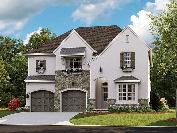 Newport II - French Cottage e 2-Car Front Load Garage Note Renderings may show optional featu
