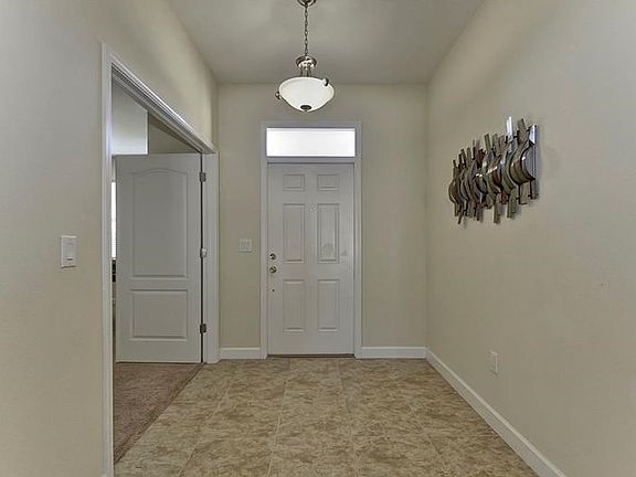 Office/playroom/Bedroom 5 off large foyer