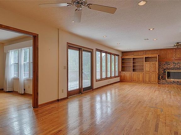 View from kitchen to living room, dining area and family room.