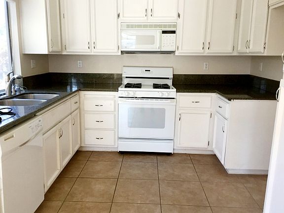 Open kitchen with granite counters