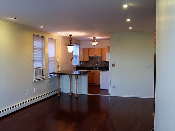 View of living room to kitchen