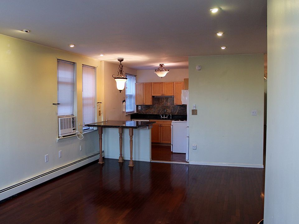 View of living room to kitchen