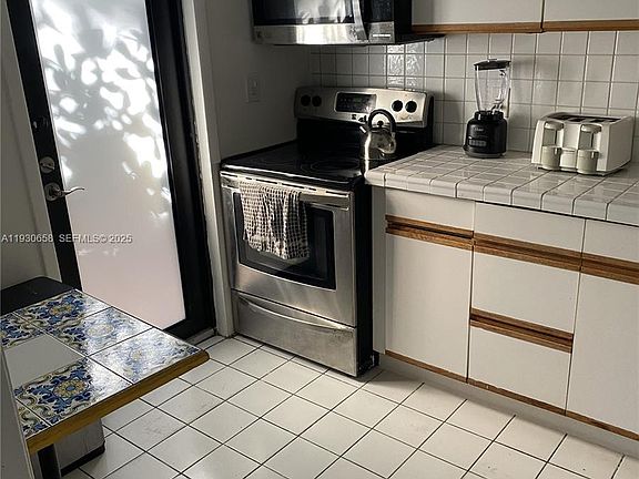 2nd image of 8950 Collins Ave #7