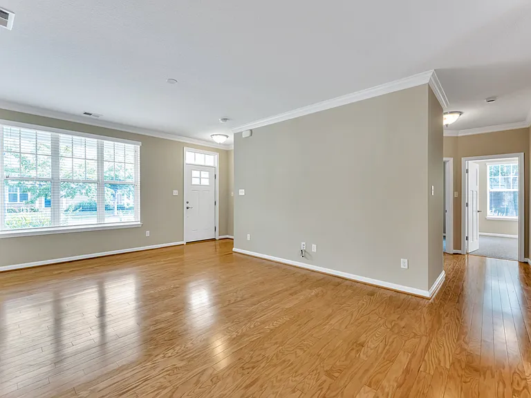 living area + view on front door and on the hallway to the bedrooms