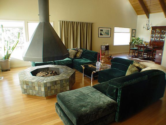 Living room with circular fireplace