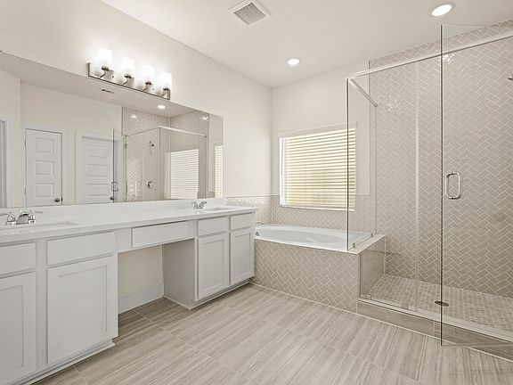 Primary bath with dual sinks soaking tub