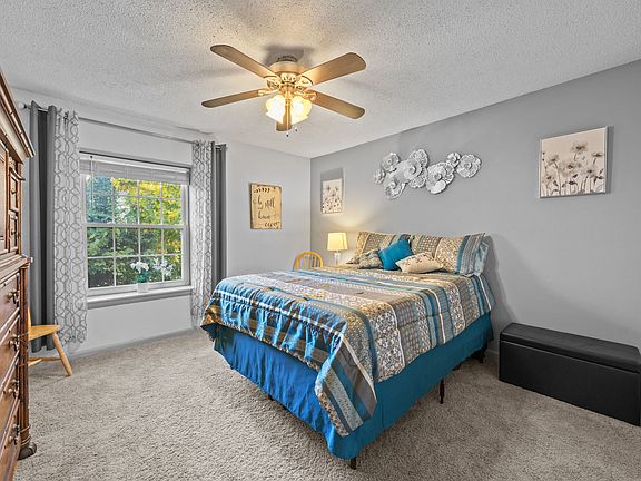 Bedroom 1 facing lush greenery