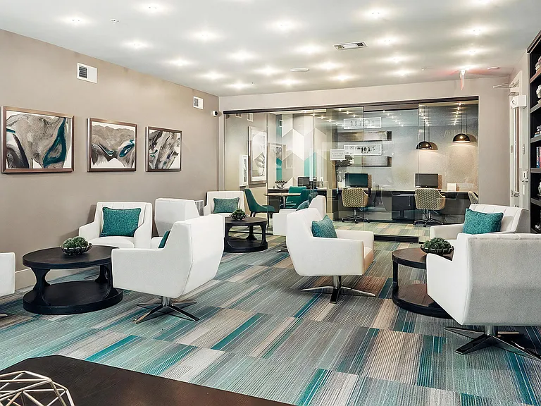 Clubhouse Lounge with Modern Seating and Glass-Enclosed Business Center