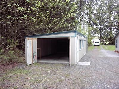 Garage doors open.