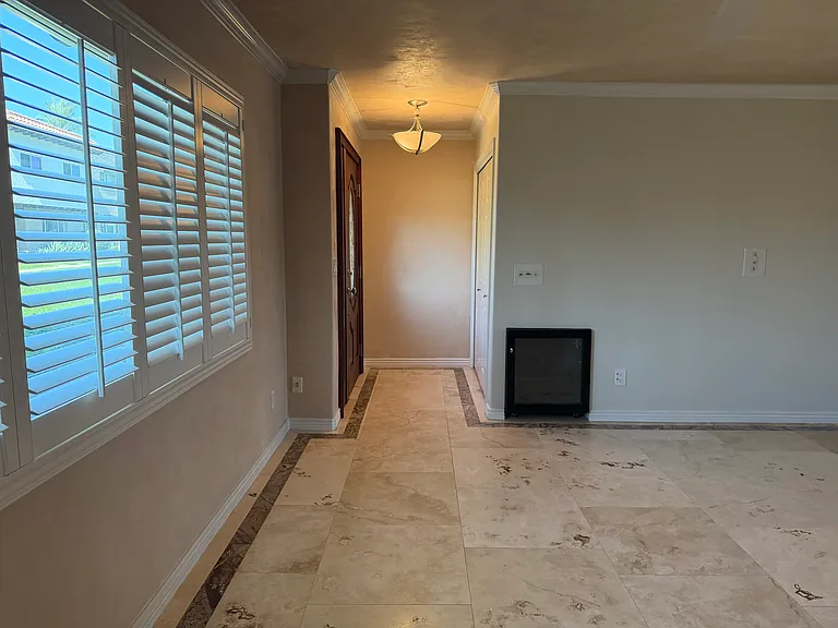 Front entry way and coat/broom closet. Media center pre-wired with hdmi.