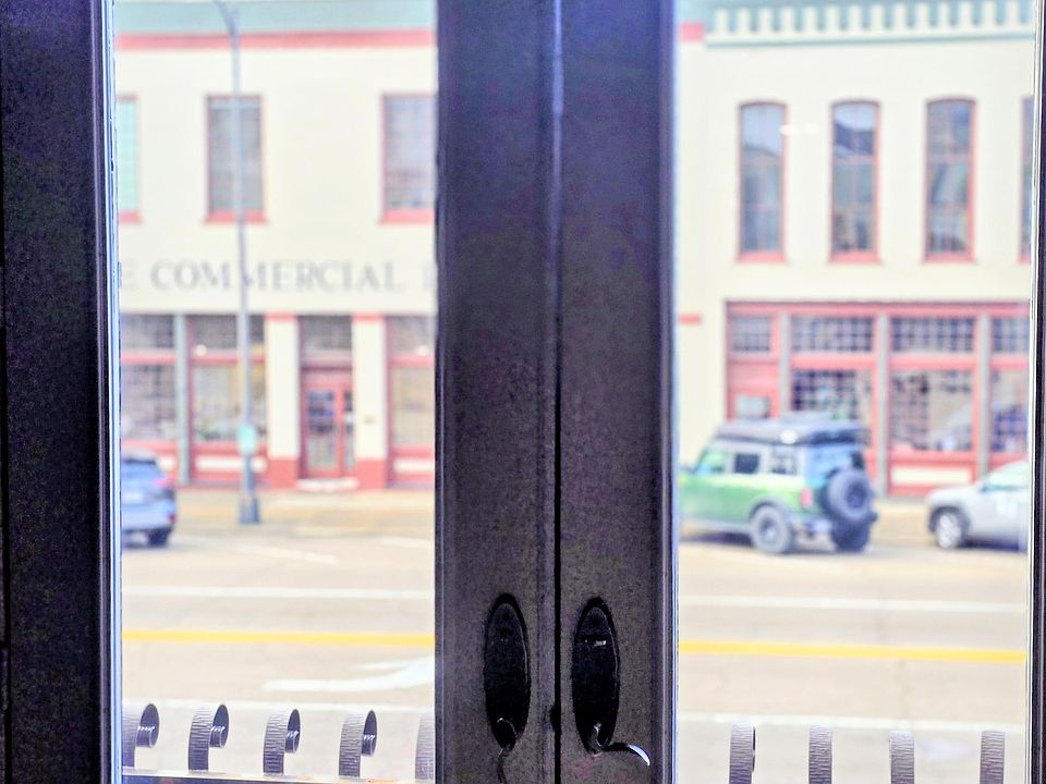 French doors onto balcony over Main St