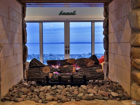 Entry with dining room to left, living room straight ahead and kitchen to the right