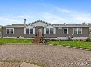 7633 Bradlyn Dr NE, Rockford, MI 49341