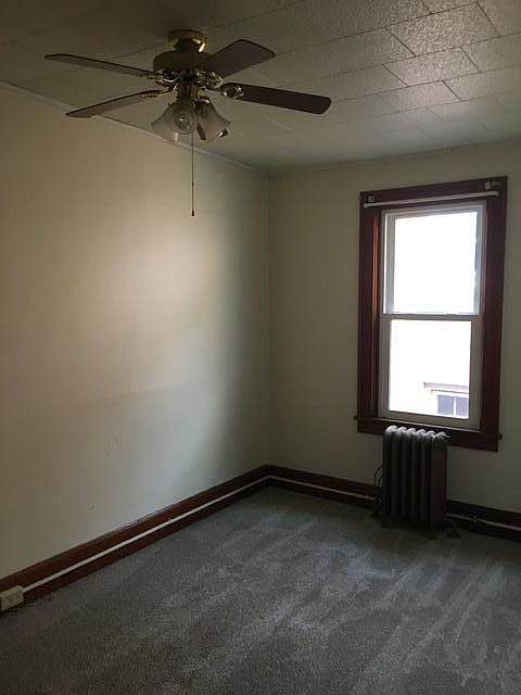 Medium sized bedroom. Soon to have hardwood floors with area rug. Photos coming soon.