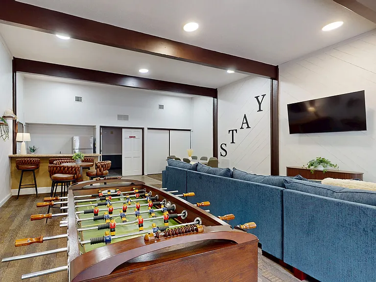 Foosball Table and TV in Community Room
