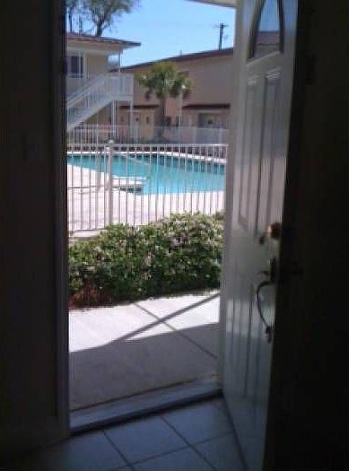 DOOR OPENS TO POOL