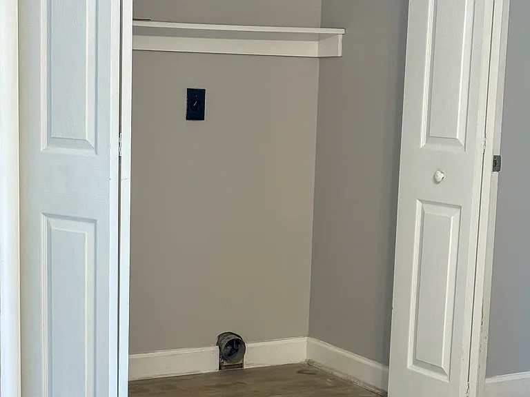 Laundry connections off master bedroom and dining room.