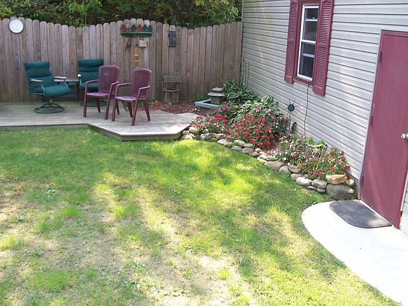 Small deck in back for firepit.