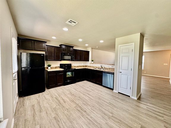 5th image of 7309 S Gardenia Ave