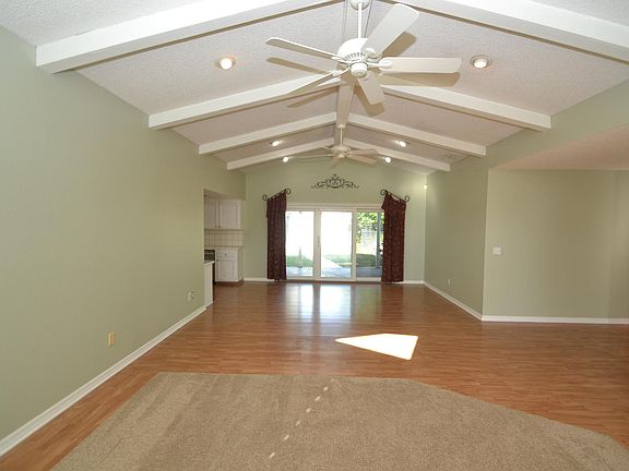 Living Room looking toward dining area and backyard