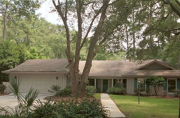 Immaculately maintained 2900 SF Home on half-acre lot with very private back y