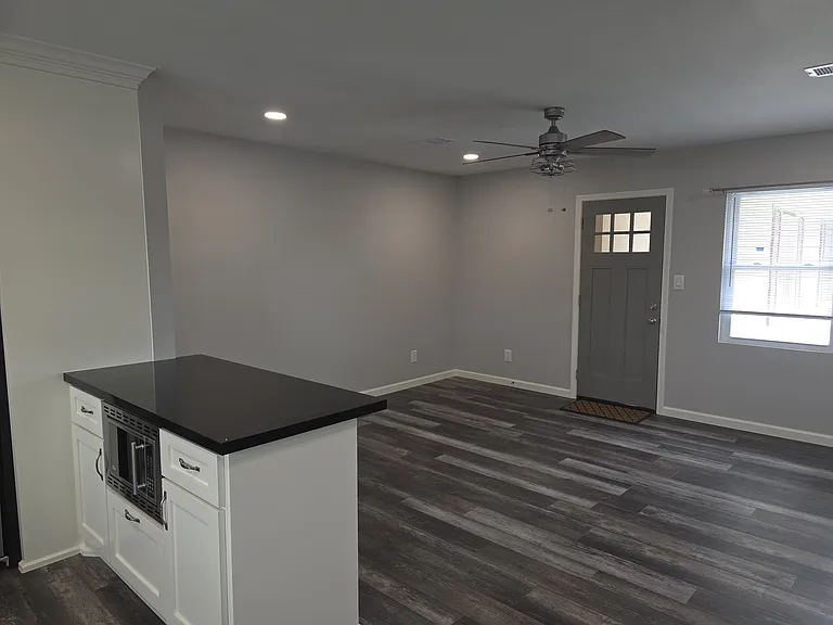 View of living room from dinning room and Kitchen, Island with builtin Microve wave