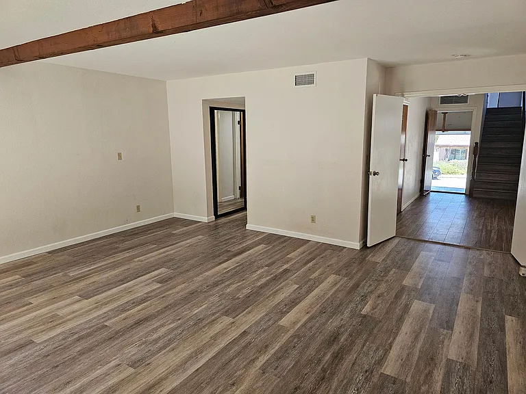 Masterbedroom looking towards hallway to master bath.