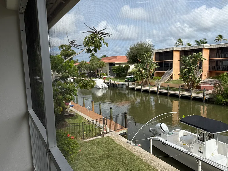 Boat slip area off of patio on canal