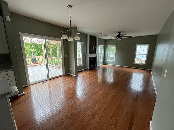 Slider from kitchen/family area opens to back deck