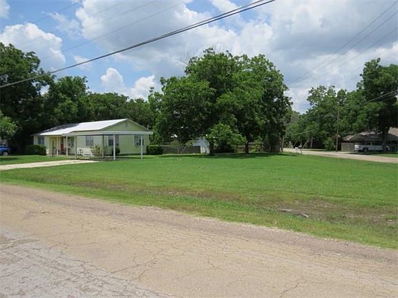 Side yard at corner of Sandoval Rd. and 3rd St.