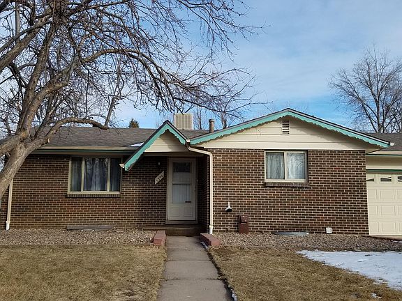 Front of house - 2 car garage + plenty of driveway and street parking.