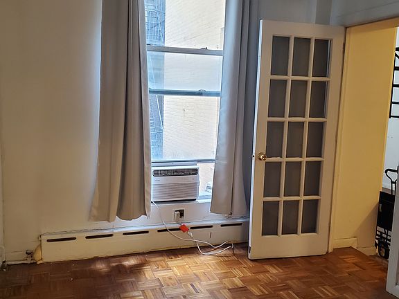 3rd image of 52 E 13th St APT 4E