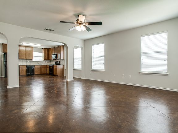 3127 Waits, Unit 103. Open between living room, dining room, and kitchen.