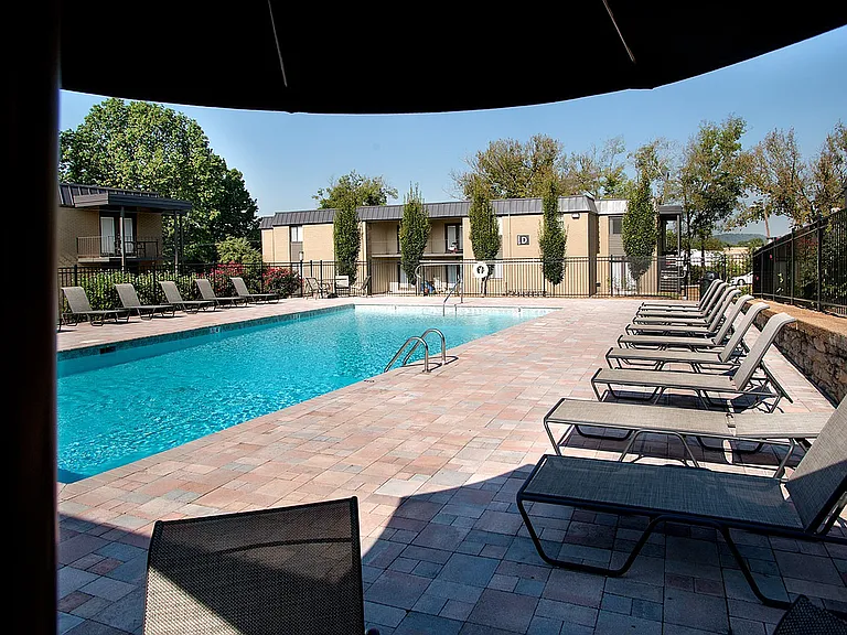 Relax and unwind at this luxurious poolside oasis, perfect for sunny days.