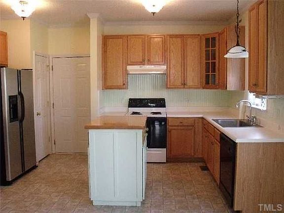 Kitchen Opens to Family Room