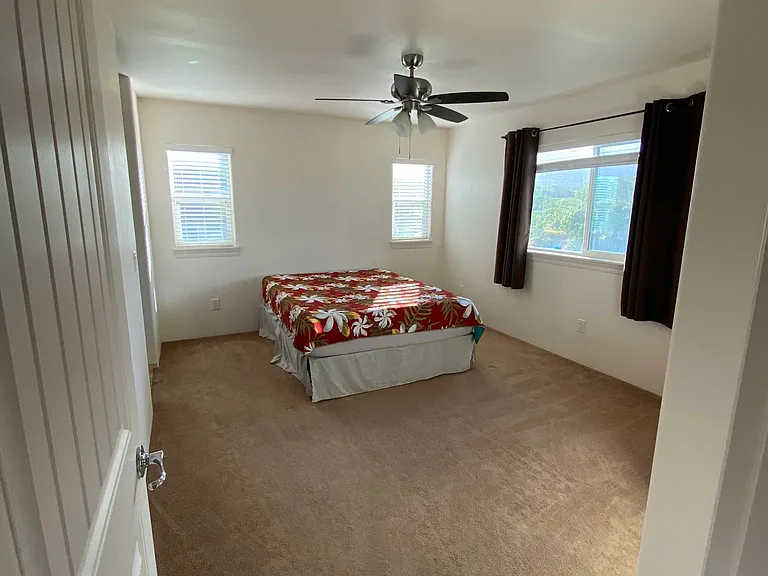 Master bedroom with queen bed