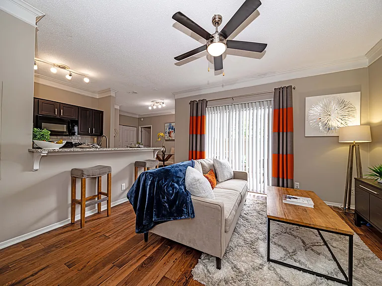 Spacious living room with hardwood-style flooring